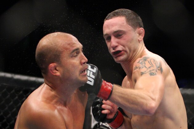 Frankie Edgar, right, in action against BJ Penn during their UFC fight at the TD Garden on Saturday, August 28, 2010 in Boston, MA. Edgar retained his UFC lightweight title via unanimous decision. (AP Photo/Gregory Payan)