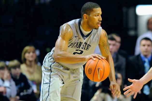 UNIVERSITY PARK, PA - MARCH 02:  D.J. Newbill #2 of the Penn State Nittany Lions drives to the basket around the defense of Josh Gasser #21 of the Wisconsin Badgers during the second half at the Bryce Jordan Center on March 2, 2014 in University Park, Pennsylvania.  Wisconsin defeated Penn State 71-66.  (Photo by Rich Barnes/Getty Images)