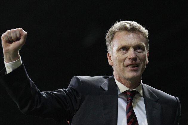 Manchester United manager David Moyes celebrates after his team's 3-0 Champions League last 16 second leg soccer match win against Olympiacos at Old Trafford Stadium, Manchester, England, Wednesday, March 19, 2014. (AP Photo/Jon Super) Manchester United manager David Moyes celebrates after his team's 3-0 Champions League last 16 second leg soccer match win against Olympiacos at Old Trafford Stadium, Manchester, England, Wednesday, March 19, 2014. (AP Photo/Jon Super)