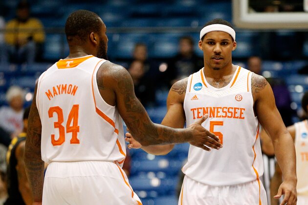 DAYTON, OH - MARCH 19: Jarnell Stokes #5 and Jeronne Maymon #34 of the Tennessee Volunteers celebrate after defeating the Iowa Hawkeyes 78-65 in overtime in the first round of the 2014 NCAA Men's Basketball Tournament at UD Arena on March 19, 2014 in Dayton, Ohio.  (Photo by Gregory Shamus/Getty Images)