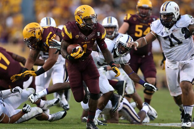 TEMPE, AZ - OCTOBER 19:  Running back Marion Grice #1 of the Arizona State Sun Devils rushes the football against the Washington Huskies during the college football game at Sun Devil Stadium on October 19, 2013 in Tempe, Arizona. The Sun Devils defeated the Huskies 53-24.  (Photo by Christian Petersen/Getty Images)