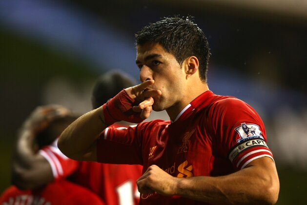 LONDON, ENGLAND - DECEMBER 15:  Luis Suarez of Liverpool celebrates scoring their fourth goal during the Barclays Premier League match between Tottenham Hotspur and Liverpool at White Hart Lane on December 15, 2013 in London, England.  (Photo by Paul Gilham/Getty Images)