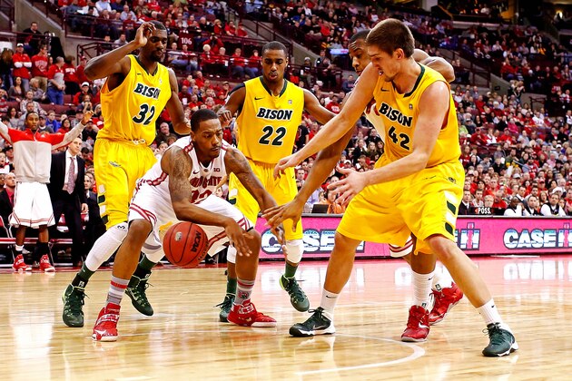 COLUMBUS, OH - DECEMBER 14:  Lenzelle Smith, Jr. #32 of the Ohio State Buckeyes attempts to keep the ball from Marshall Bjorklundj #42, Kory Brown #22, and TrayVonn Wright #32, all of the North Dakota State Bison during the second half at Value City Arena on December 14, 2013 in Columbus, Ohio. Ohio State defeated North Dakota State 79-62. (Photo by Kirk Irwin/Getty Images)