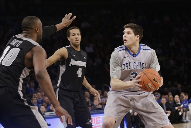 Creighton's Doug McDermott (3) protects the ball from Providence's Kadeem Batts (10) during the first half of an NCAA college basketball game in the finals of the Big East Conference tournament Saturday, March 15, 2014, at Madison Square Garden in New York. (AP Photo/Frank Franklin II)