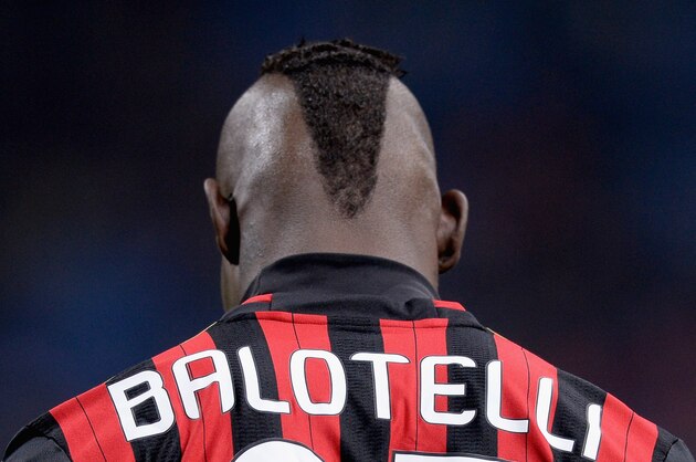 MILAN, ITALY - FEBRUARY 14:  Mario Balotelli of AC Milan during the Serie A match between AC Milan and Bologna FC at San Siro Stadium on February 14, 2014 in Milan, Italy.  (Photo by Claudio Villa/Getty Images)