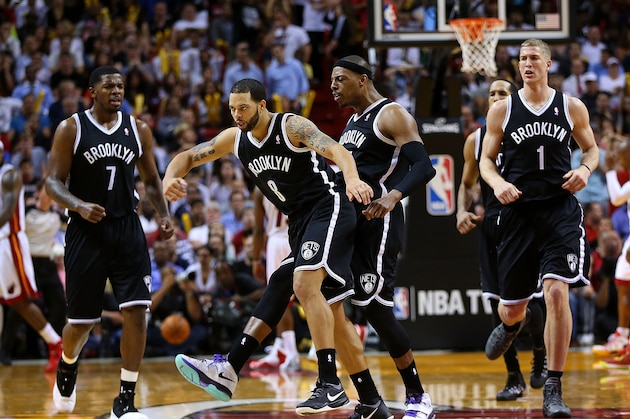 MIAMI, FL - MARCH 12: Deron Williams #8 and Paul Pierce #34 of the Brooklyn Nets celebrate a play during a game against the Miami Heat at American Airlines Arena on March 12, 2014 in Miami, Florida. NOTE TO USER: User expressly acknowledges and agrees that, by downloading and/or using this photograph, user is consenting to the terms and conditions of the Getty Images License Agreement. Mandatory copyright notice: (Photo by Mike Ehrmann/Getty Images) MIAMI, FL - MARCH 12: Deron Williams #8 and Paul Pierce #34 of the Brooklyn Nets celebrate a play during a game against the Miami Heat at American Airlines Arena on March 12, 2014 in Miami, Florida. NOTE TO USER: User expressly acknowledges and agrees that, by downloading and/or using this photograph, user is consenting to the terms and conditions of the Getty Images License Agreement. Mandatory copyright notice: (Photo by Mike Ehrmann/Getty Images)
