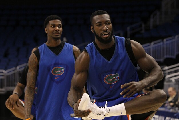 Mar 19, 2014; Orlando, FL, USA; Florida Gators center Patric Young (4) stretches during practice before the second round of the 2014 NCAA Tournament at Amway Center. Mandatory Credit: Kim Klement-USA TODAY Sports