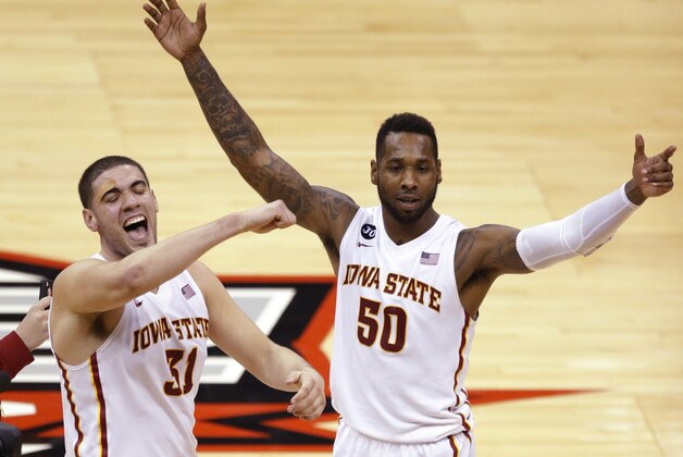 Iowa State forward Georges Niang (31) and guard DeAndre Kane (50) celebrate following an NCAA college basketball game in the final of the Big 12 Conference men's tournament in Kansas City, Mo., Saturday, March 15, 2014. Iowa State defeated Baylor 74-65. (AP Photo/Orlin Wagner)