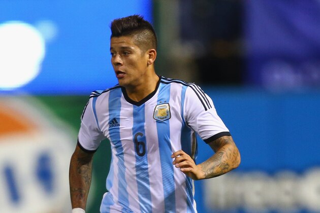 ST. LOUIS, MO - NOVEMBER 18: Marcos Rojo #6 controls the ball during the international friendly match between Bosnia-Herzegovina and Argentina at Busch Stadium on November 18, 2013 in St. Louis, Missouri.  (Photo by Dilip Vishwanat/Getty Images)