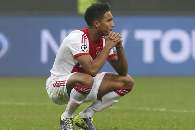 Ajax forward Danny Hoesen reacts at the end of a Champions League, Group H, soccer match between AC Milan and Ajax at the San Siro stadium in Milan, Italy, Wednesday, Dec. 11, 2013. The match ended 0-0 and AC Milan advances to the knockout phase. (AP Photo/Antonio Calanni)