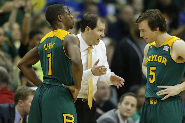 Baylor head coach Scott Drew talks with Baylor guards Kenny Chery (1) and Brady Heslip (5) during the second half of an NCAA college basketball game against Iowa State in the finals of the Big 12 Conference men's tournament in Kansas City, Mo., Saturday, March 15, 2014. (AP Photo/Orlin Wagner) Baylor head coach Scott Drew talks with Baylor guards Kenny Chery (1) and Brady Heslip (5) during the second half of an NCAA college basketball game against Iowa State in the finals of the Big 12 Conference men's tournament in Kansas City, Mo., Saturday, March 15, 2014. (AP Photo/Orlin Wagner)