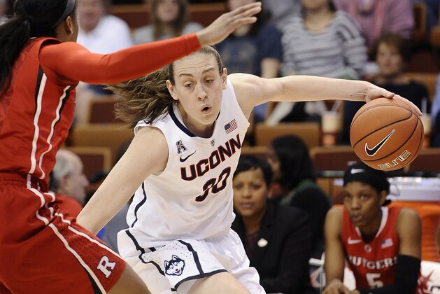 Connecticut's Breanna Stewart dribbles the ball during the first half of an NCAA college basketball game against Rutgers in the semifinals of the American Athletic Conference women's basketball tournament, Sunday, March 9, 2014, in Uncasville, Conn. (AP Photo/Jessica Hill)