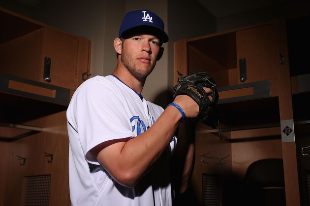 GLENDALE, AZ - FEBRUARY 20:  Pitcher Clayton Kershaw #22 of the Los Angeles Dodgers poses for a portrait during spring training photo day at Camelback Ranch on February 20, 2014 in Glendale, Arizona.  (Photo by Christian Petersen/Getty Images)