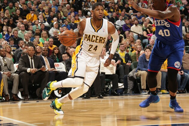 INDIANAPOLIS - MARCH 17: Paul George #24 of the Indiana Pacers handles the ball against the Philadelphia 76ers at Bankers Life Fieldhouse on March 17, 2014 in Indianapolis, Indiana. NOTE TO USER: User expressly acknowledges and agrees that, by downloading and or using this Photograph, user is consenting to the terms and condition of the Getty Images License Agreement. Mandatory Copyright Notice: 2014 NBAE (Photo by Ron Hoskins/NBAE via Getty Images) INDIANAPOLIS - MARCH 17: Paul George #24 of the Indiana Pacers handles the ball against the Philadelphia 76ers at Bankers Life Fieldhouse on March 17, 2014 in Indianapolis, Indiana. NOTE TO USER: User expressly acknowledges and agrees that, by downloading and or using this Photograph, user is consenting to the terms and condition of the Getty Images License Agreement. Mandatory Copyright Notice: 2014 NBAE (Photo by Ron Hoskins/NBAE via Getty Images)