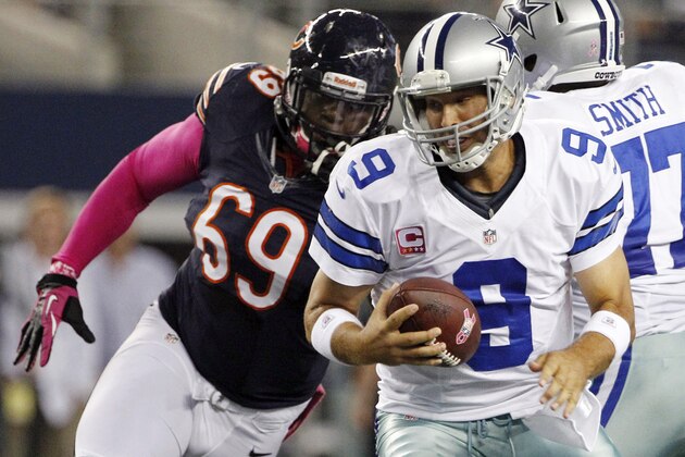 Chicago Bears defensive tackle Henry Melton (69) moves in to sack Dallas Cowboys quarterback Tony Romo (9) during the first half of an NFL football game, Monday, Oct. 1, 2012, in Arlington, Texas. (AP Photo/Tony Gutierrez)