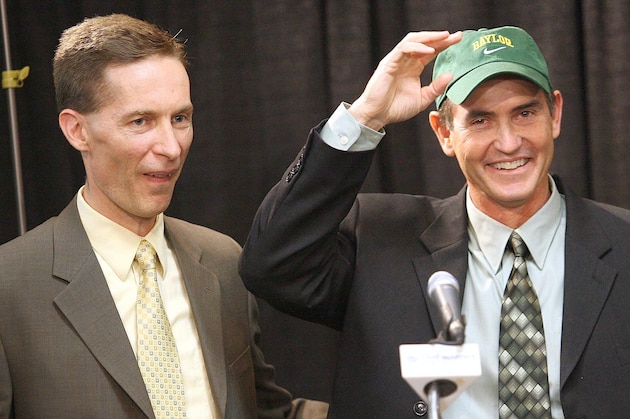 Houston football coach Art Briles, right, is introduced as the new Baylor football coach by Baylor athletic director Ian McCaw during a news conference Wednesday, Nov. 28, 2007, in Waco, Texas. (AP Photo/Duane A. Laverty)