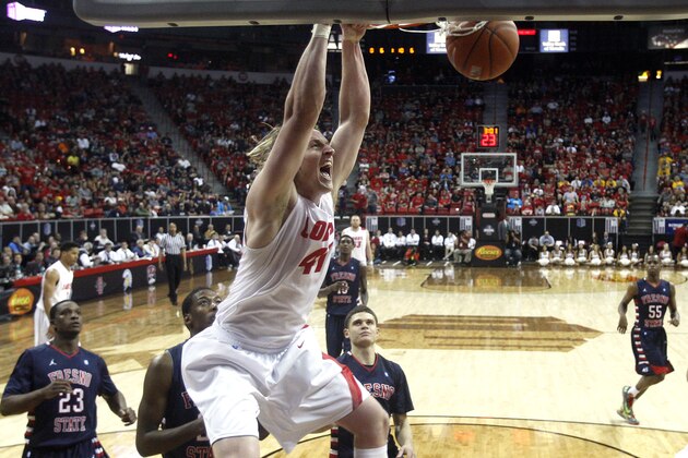 New Mexico's Cameron Bairstow dunks during the second half of an NCAA college basketball game against Fresno State in the quarterfinals of the Mountain West Conference tournament, Thursday, March 13, 2014, in Las Vegas. New Mexico defeated Fresno State 93-77. (AP Photo/Isaac Brekken) New Mexico's Cameron Bairstow dunks during the second half of an NCAA college basketball game against Fresno State in the quarterfinals of the Mountain West Conference tournament, Thursday, March 13, 2014, in Las Vegas. New Mexico defeated Fresno State 93-77. (AP Photo/Isaac Brekken)