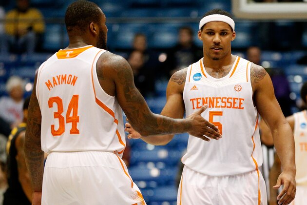 DAYTON, OH - MARCH 19: Jarnell Stokes #5 and Jeronne Maymon #34 of the Tennessee Volunteers celebrate after defeating the Iowa Hawkeyes 78-65 in overtime in the first round of the 2014 NCAA Men's Basketball Tournament at UD Arena on March 19, 2014 in Dayton, Ohio.  (Photo by Gregory Shamus/Getty Images)