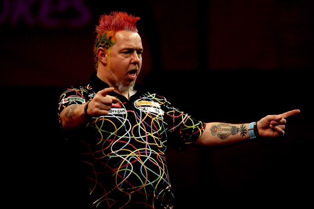 LONDON, ENGLAND - JANUARY 01: Peter Wright of Scotland celebrates winning the fifth set during the final of the Ladbrokes.com World Darts Championships against Michael van Gerwen of The Netherlands at Alexandra Palace on January 1, 2014 in London, England. (Photo by Ben Hoskins/Getty Images) LONDON, ENGLAND - JANUARY 01: Peter Wright of Scotland celebrates winning the fifth set during the final of the Ladbrokes.com World Darts Championships against Michael van Gerwen of The Netherlands at Alexandra Palace on January 1, 2014 in London, England. (Photo by Ben Hoskins/Getty Images)