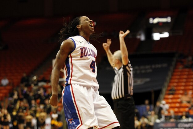Mar 14, 2014; El Paso, TX, USA; Louisiana Tech Bulldogs guard Kenneth Smith (4) celebrates with teammates after hitting a three point shot against the Southern Miss Golden Eagles in the semifinals of the Conference USA college basketball tournament at Don Haskins Center. The Bulldogs defeated the Golden Eagles 88-70. Mandatory Credit: Ivan Pierre Aguirre-USA TODAY Sports