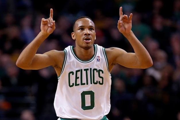 Mar 19, 2014; Boston, MA, USA; Boston Celtics guard Avery Bradley (0) celebrates after scoring during the third quarter against the Miami Heat at TD Garden. Mandatory Credit: Greg M. Cooper-USA TODAY Sports