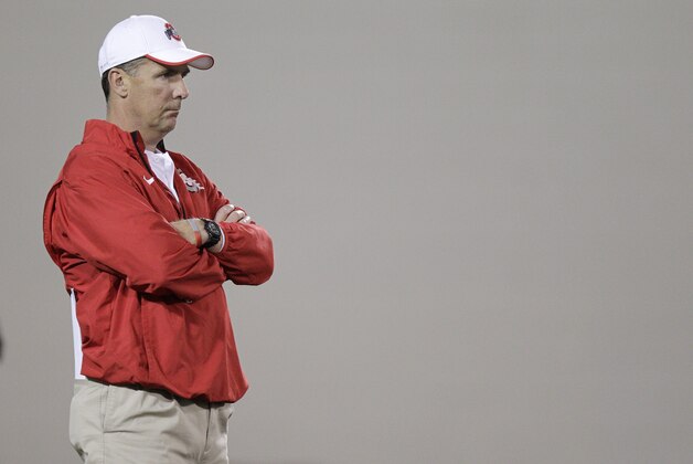 Ohio State coach Urban Meyer watches his team during NCAA college football practice Tuesday, March 4, 2014, in Columbus, Ohio. (AP Photo/Jay LaPrete)