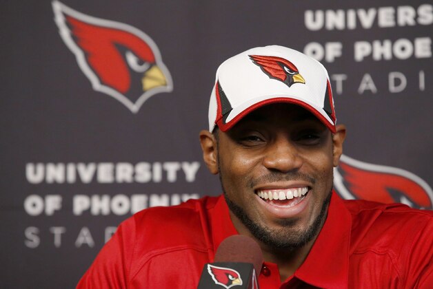 Antonio Cromartie smiles as he is introduced as an Arizona Cardinals football player during a news conference at the team's training facility, Thursday, March 20, 2014, in Tempe, Ariz. (AP Photo/Ross D. Franklin) Antonio Cromartie smiles as he is introduced as an Arizona Cardinals football player during a news conference at the team's training facility, Thursday, March 20, 2014, in Tempe, Ariz. (AP Photo/Ross D. Franklin)