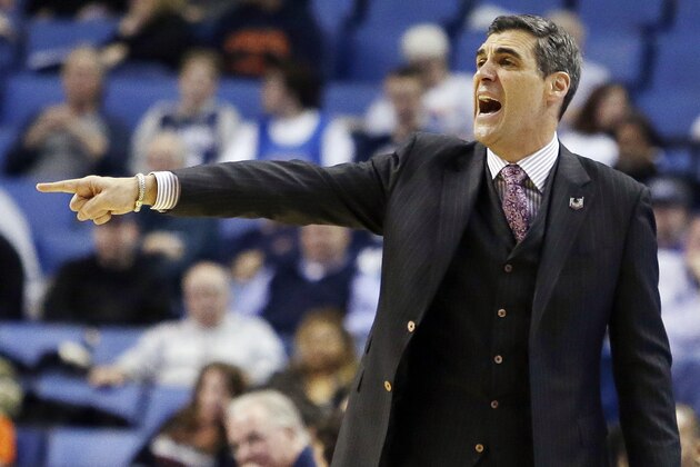 Villanova head coach Jay Wright gestures during the second half of a second-round game against Milwaukee in the NCAA college basketball tournament in Buffalo, N.Y., Thursday, March 20, 2014. (AP Photo/Nick LoVerde)