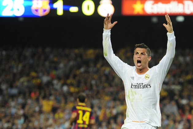 Real Madrid's Cristiano Ronaldo from Portugal reacts during the Spanish La Liga soccer match against FC Barcelona at the Camp Nou stadium in Barcelona, Spain, Saturday, Oct. 26, 2013. (AP Photo/Manu Fernandez)