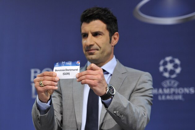 NYON, SWITZERLAND - MARCH 21:  Ambassador for the final Luis Figo draws Borussia Dortmund during the UEFA Champions League 2013/14 season quarter-finals draw at the UEFA headquarters, The House of European Football, on March 21, 2014 in Nyon, Switzerland.  (Photo by Harold Cunningham/Getty Images for UEFA)