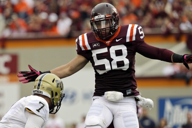 Virginia Tech linebacker Jack Tyler (58) pressures Pittsburgh quarterback Tom Savage (7) during the second half of an NCAA college football game in Blacksburg, Va., Saturday, Oct. 12, 2013. Virginia Tech won the game 19-9.   (AP Photo/Steve Helber)