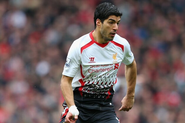 MANCHESTER, ENGLAND - MARCH 16:  Luis Suarez of Liverpool in action during the Barclays Premier League match between Manchester United and Liverpool at Old Trafford on March 16, 2014 in Manchester, England.  (Photo by Alex Livesey/Getty Images)