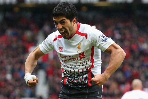 MANCHESTER, ENGLAND - MARCH 16: Luis Suarez of Liverpool celebrates scoring his team's third goal during the Barclays Premier League match between Manchester United and Liverpool at Old Trafford on March 16, 2014 in Manchester, England. (Photo by Alex Livesey/Getty Images) MANCHESTER, ENGLAND - MARCH 16: Luis Suarez of Liverpool celebrates scoring his team's third goal during the Barclays Premier League match between Manchester United and Liverpool at Old Trafford on March 16, 2014 in Manchester, England. (Photo by Alex Livesey/Getty Images)