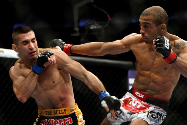 Jose Aldo, right, of Brazil and Ricardo Lamas of Chicago, IL fight in the second round of the Ultimate Fighting Featherweight Championship Mix Martial Arts bout in Newark, N.J. on Saturday, Feb. 1, 2014. Aldo won by unanimous decision in five rounds. (AP Photo/Tim Larsen) Jose Aldo, right, of Brazil and Ricardo Lamas of Chicago, IL fight in the second round of the Ultimate Fighting Featherweight Championship Mix Martial Arts bout in Newark, N.J. on Saturday, Feb. 1, 2014. Aldo won by unanimous decision in five rounds. (AP Photo/Tim Larsen)