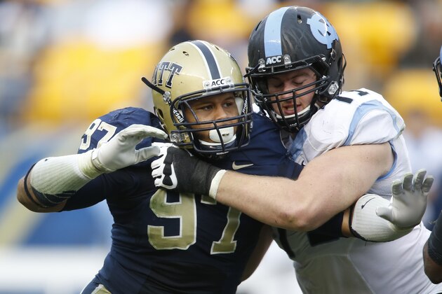 Pittsburgh defensive lineman Aaron Donald (97) in action in an NCAA football game between Pittsburgh and North Carolina, Saturday, Nov. 16, 2013 in Pittsburgh. (AP Photo/Keith Srakocic)