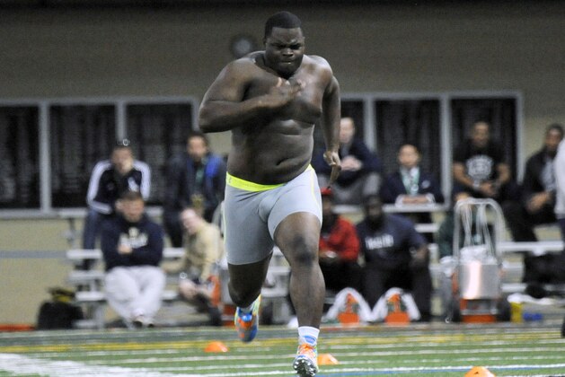 Notre Dame defensive lineman Louis Nix runs through a drill during Notre Dame's Pro Day for NFL football scouts Thursda, March 20, 2014, in South Bend, Ind. (AP Photo/Joe Raymond) Notre Dame defensive lineman Louis Nix runs through a drill during Notre Dame's Pro Day for NFL football scouts Thursda, March 20, 2014, in South Bend, Ind. (AP Photo/Joe Raymond)