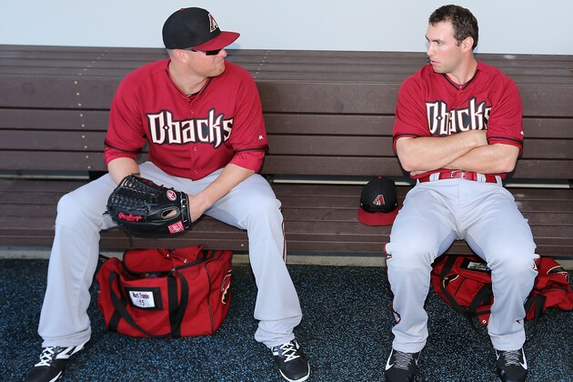 MESA, AZ - FEBRUARY 27:  Mark Trumbo #15 and Paul Goldschmidt #44 of the Arizona Diamondbacks sit in the dugout before the spring training game against the Chicago Cubs at Cubs Park on February 27, 2014 in Mesa, Arizona  (Photo by Christian Petersen/Getty Images)
