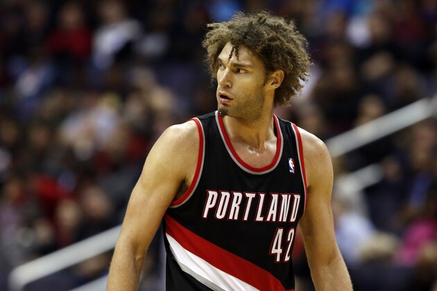 Portland Trail Blazers center Robin Lopez (42) looks over his shoulder in the second half of an NBA basketball game against the Washington Wizards, Monday, Feb. 3, 2014, in Washington. The Wizards won 100-90. (AP Photo/Alex Brandon)