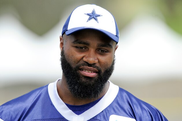 Dallas Cowboys linebacker Anthony Spencer talks with the press as he leaves the field during the Cowboys training camp, Monday, July 22, 2013, in Oxnard, Calif. (AP Photo/Gus Ruelas)