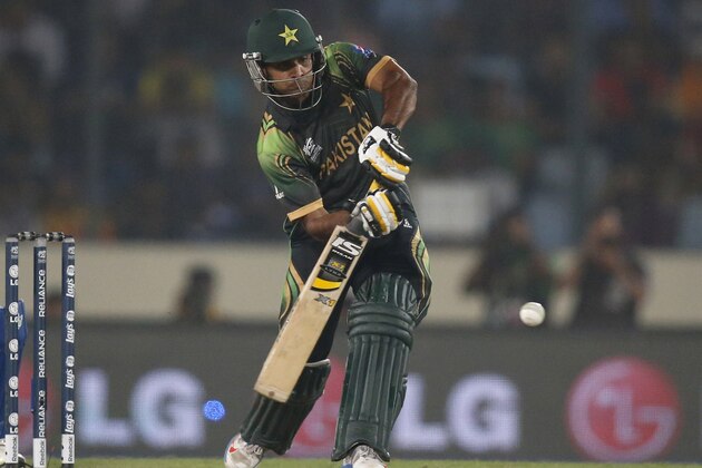 Pakistan's captain Mohammad Hafeez bats during their ICC Twenty20 Cricket World Cup match against India in Dhaka, Bangladesh, Friday, March 21, 2014. (AP Photo/Aijaz Rahi)