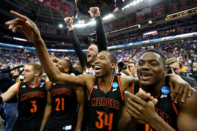 RALEIGH, NC - MARCH 21:  Jibri Bryan #34 of the Mercer Bears celebrates with teammates after defeating the Duke Blue Devils 78-71 during the Second Round of the 2014 NCAA Basketball Tournament at PNC Arena on March 21, 2014 in Raleigh, North Carolina.  (Photo by Streeter Lecka/Getty Images)