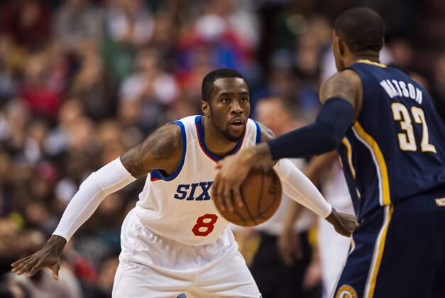 Mar 14, 2014; Philadelphia, PA, USA; Philadelphia 76ers guard Tony Wroten (8) defends the dribble of Indiana Pacers guard C.J. Watson (32) during the second quarter at the Wells Fargo Center. The Pacers defeated the Sixers 101-94. Mandatory Credit: Howard Smith-USA TODAY Sports