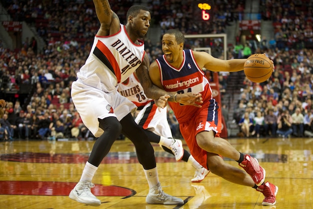 Mar 20, 2014; Portland, OR, USA;  Washington Wizards guard Andre Miller (24) dribbles the ball as Washington Wizards guard Andre Miller (24) defends at Moda Center. Mandatory Credit: Jaime Valdez-USA TODAY Sports