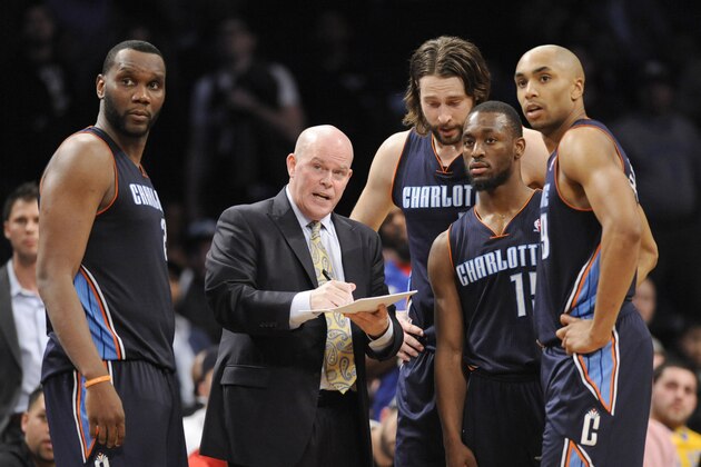 Charlotte Bobcats coach Steve Clifford talks to his team during the fourth quarter of an NBA basketball game against the Brooklyn Nets Wednesday, March 19, 2014, at Barclay's Center in New York. Brooklyn won 104-99. (AP Photo/Bill Kostroun)