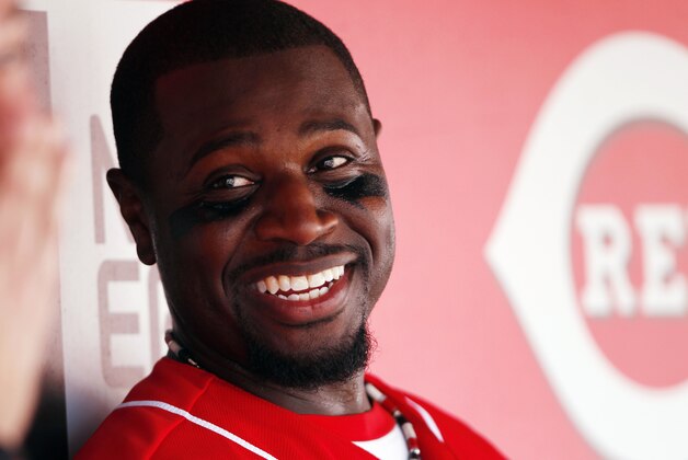 Sep 28, 2013; Cincinnati, OH, USA; Cincinnati Reds second baseman Brandon Phillips (4) in the dugout during the third inning against the Pittsburgh Pirates at Great American Ball Park. Mandatory Credit: Frank Victores-USA TODAY Sports