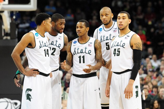 SPOKANE, WA - MARCH 20:  The Michigan State Spartans huddle together during their game against the Delaware Fightin Blue Hens in the second round of the 2014 NCAA Men's Basketball Tournament at Spokane Veterans Memorial Arena on March 20, 2014 in Spokane, Washington.  (Photo by Steve Dykes/Getty Images)