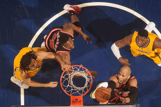 INDIANAPOLIS - MARCH 21: Taj Gibson #22 of the Chicago Bulls shoots against the Indiana Pacers at Bankers Life Fieldhouse on March 21, 2014 in Indianapolis, Indiana.  NOTE TO USER: User expressly acknowledges and agrees that, by downloading and or using this Photograph, user is consenting to the terms and condition of the Getty Images License Agreement. Mandatory Copyright Notice: 2014 NBAE  (Photo by Ron Hoskins/NBAE via Getty Images)