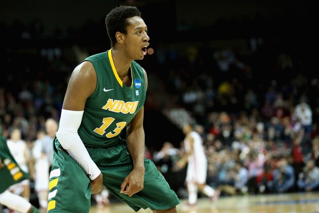 SPOKANE, WA - MARCH 20:  Carlin Dupree #13 of the North Dakota State Bison celebrates against the Oklahoma Sooners during the second round of the 2014 NCAA Men's Basketball Tournament at Spokane Veterans Memorial Arena on March 20, 2014 in Spokane, Washington.  North Dakota State won the game 80-75.  (Photo by Stephen Dunn/Getty Images)