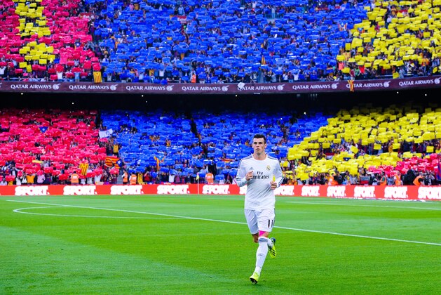 BARCELONA, SPAIN - OCTOBER 26:  Gareth Bale of Real Madrid CF runs prior to the La Liga match between FC Barcelona and Real Madrid CF at Camp Nou on October 26, 2013 in Barcelona, Spain.  (Photo by David Ramos/Getty Images)