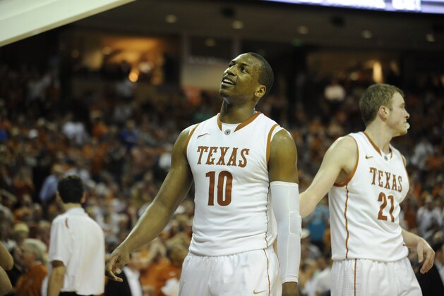 Feb 1, 2014; Austin, TX, USA; Texas Longhorns forwards Jonathan Holmes (10) and Connor Lammert (21) react against the Kansas Jayhawks during the second half at the Frank Erwin Special Events Center. Texas beat Kansas 81-69. Mandatory Credit: Brendan Maloney-USA TODAY Sports
